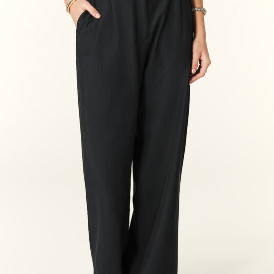 Navy blue smart trousers with front pleats