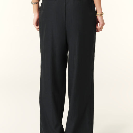 Navy blue smart trousers with front pleats