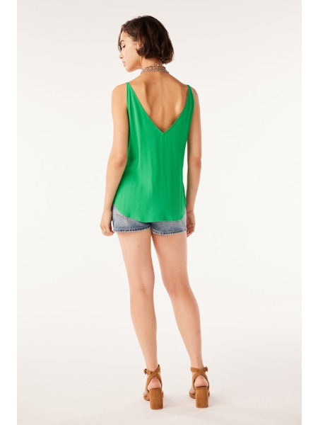 Bright green camisole with thin straps and scoop neck with V backline