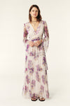 Ecru V neck maxi dress with fluted sheer sleeves empire line and purple floral design with net overlay with iridescent gems all over