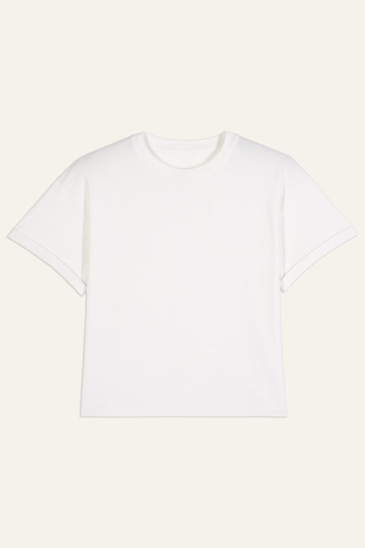 Ecru t-shirt on a beige background