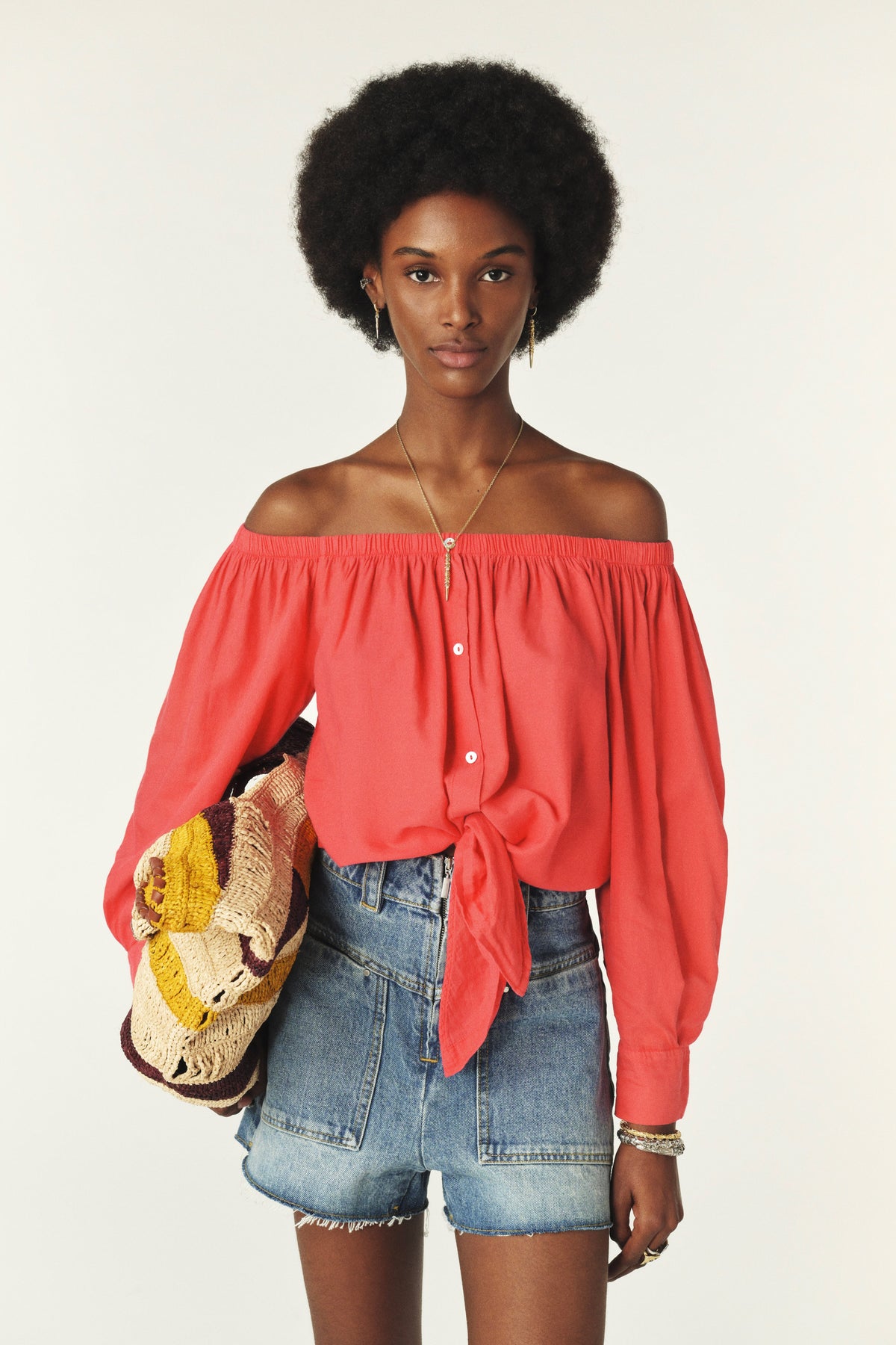 Coral coloured cotton shirt to be worn off the shoulder with a tie front