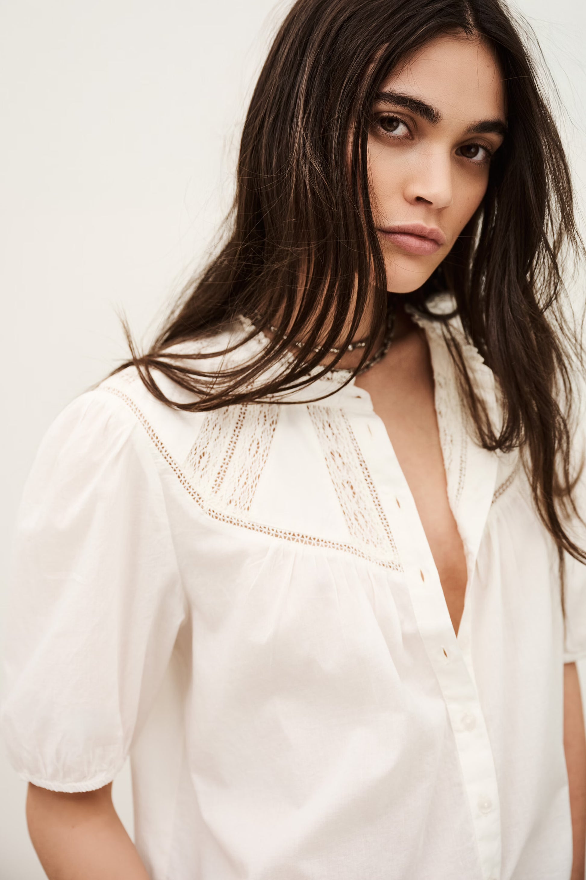 Close up of white short sleeve shirt from ba&sh