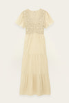 Beige dress with lace detailing on a white background