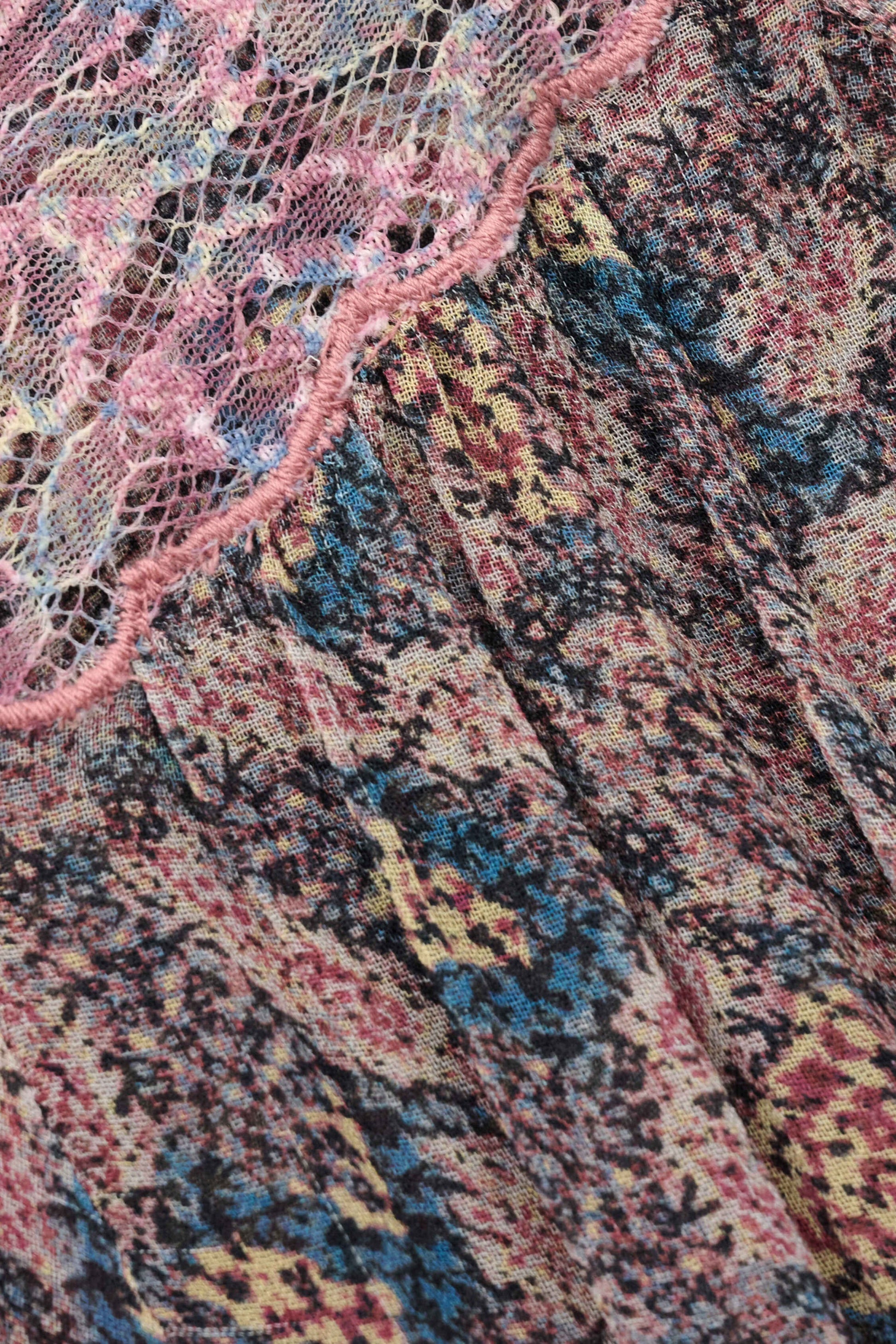 Close-up of a textured fabric with a multicolor pattern