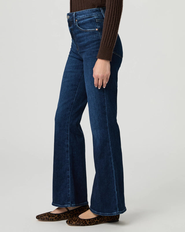 Side view of blue kick flare denim