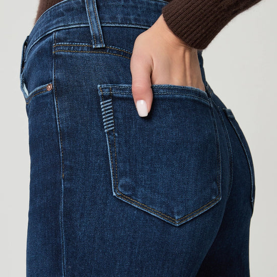 Close-up of blue jeans with a neutral background from paige