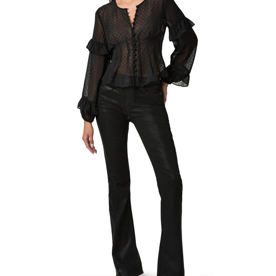 sheer polka dot black blouse with ruffle detailing and drawstring at the rear model shot