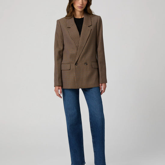 Double breasted brown dog tooth check blazer worn with blue jeans