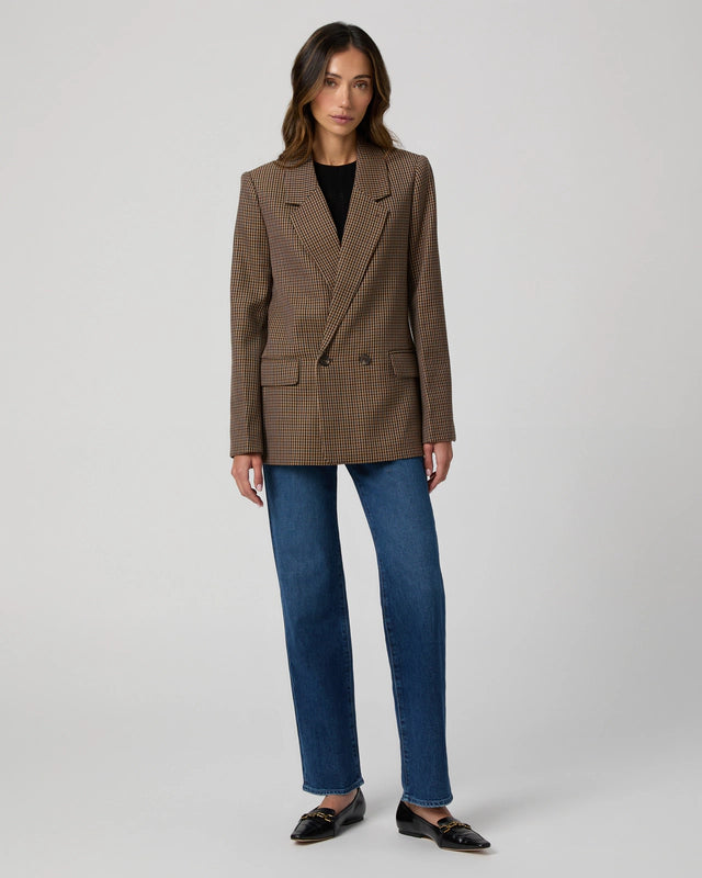 Double breasted brown dog tooth check blazer worn with blue jeans