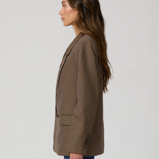 Side view of dog tooth check double breasted blazer