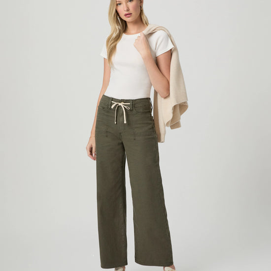 khaki green wide leg trousers with cream drawstring tie from paige model