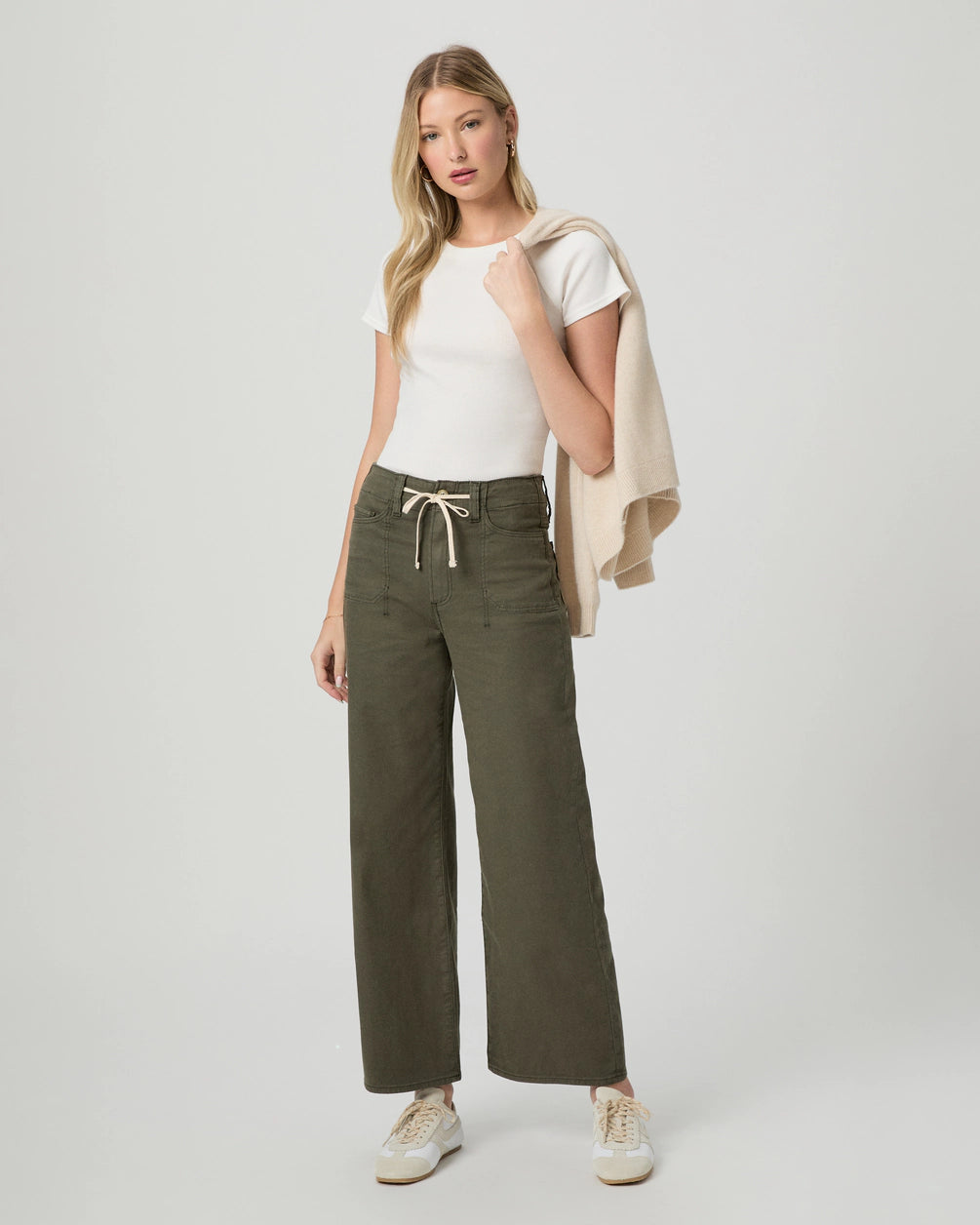 khaki green wide leg trousers with cream drawstring tie from paige model