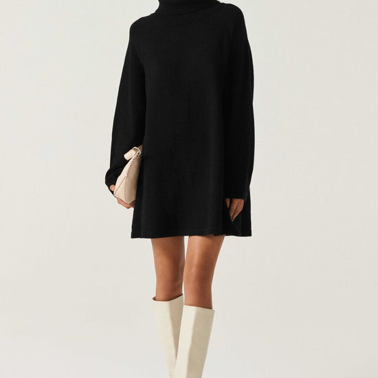 Roll neck heavy knitted black mini dress with raglan sleeves