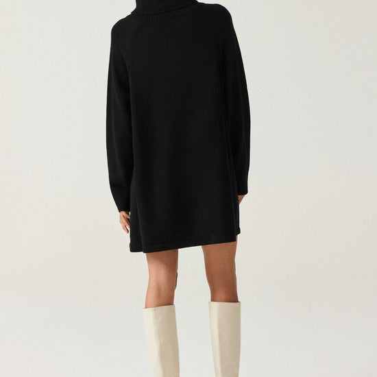 Roll neck heavy knitted black mini dress with raglan sleeves