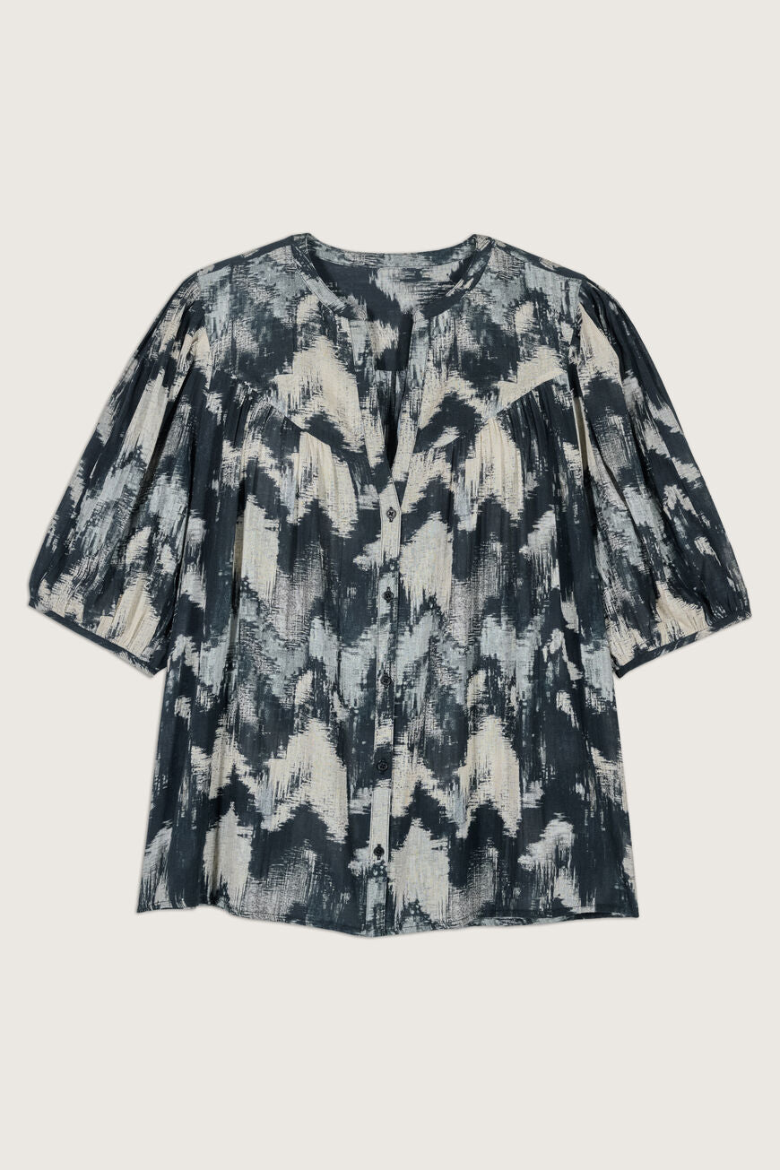 Black and ecru blurred chevron lightweight blouse with elbow length puff sleeves and a notch neckline