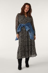 Long midi monochrome dress with long puff sleeves and contrast print details
