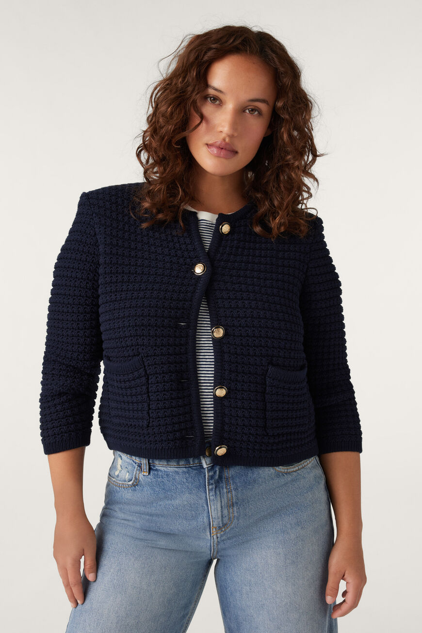 Navy blue round neck textured cardigan with two front pockets and fancy buttons