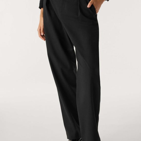 Black tailored trousers