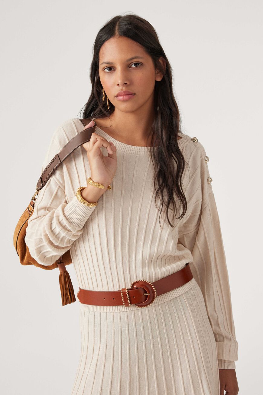 Ribbed ecru knitted top with ribbed detailing and silver knotted buttons on left shoulder