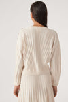 Ribbed ecru knitted top with ribbed detailing and silver knotted buttons on left shoulder