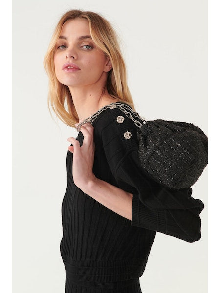Ribbed black knitted top with ribbed detailing and silver knotted buttons on left shoulder