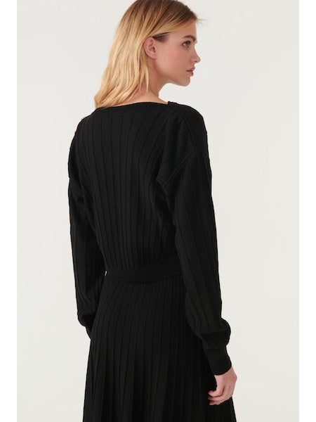 Ribbed black knitted top with ribbed detailing and silver knotted buttons on left shoulder