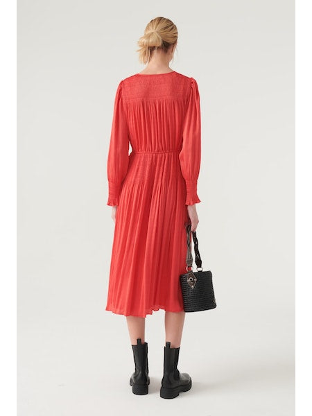 V neck mid length dress with shirred shoulders and long sleeves