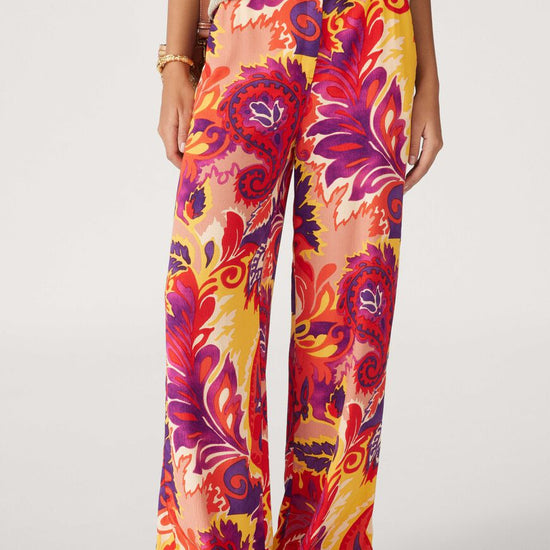 Bright purple, pink, orange and yellow wide leg trousers