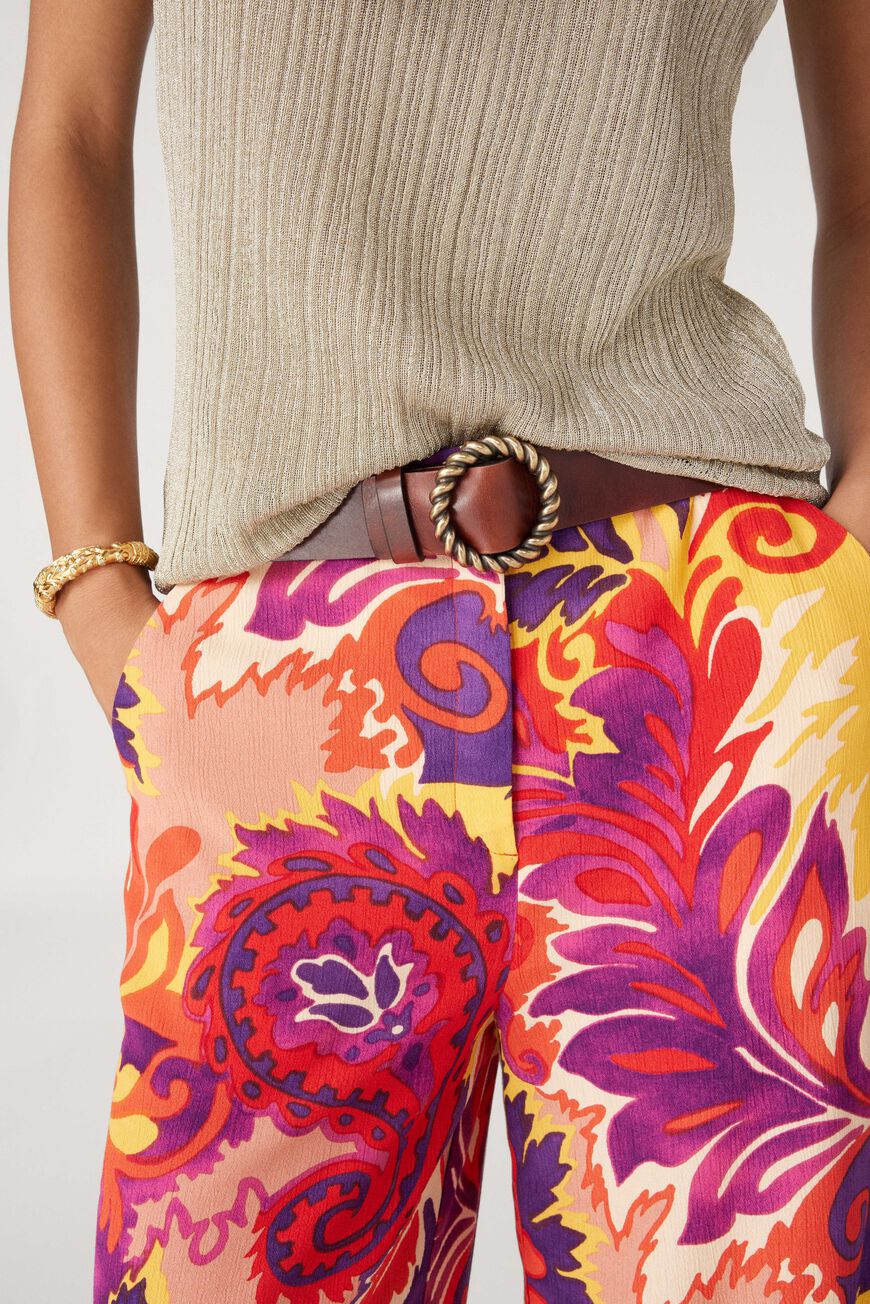 Bright purple, pink, orange and yellow wide leg trousers