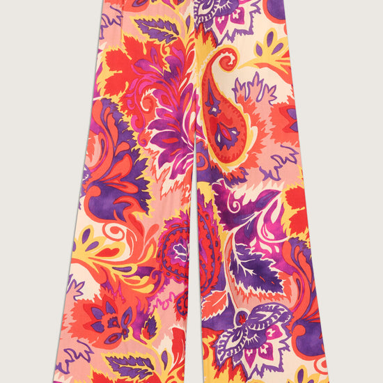 Bright purple, pink, orange and yellow wide leg trousers