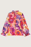 Button through blouse with long sleeves ruffle collar in a vibrant paisley inspired orange yellow and purple print
