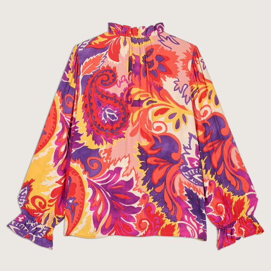 Button through blouse with long sleeves ruffle collar in a vibrant paisley inspired orange yellow and purple print