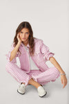 Rose and white vertical striped denim style jacket with silver metallic button fastening and long sleeves