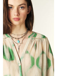 ecru and green bohemian print shirt with v-neck and elasticated cuffs