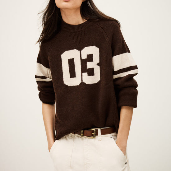 brown cashmere round neck sweater with 03 on front model shot