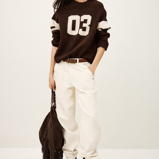 brown cashmere round neck sweater with 03 on front model shot