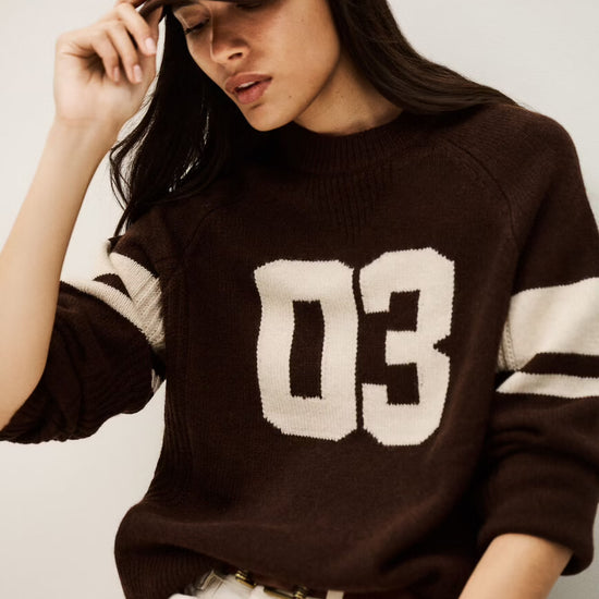 brown cashmere round neck sweater with 03 on front model shot