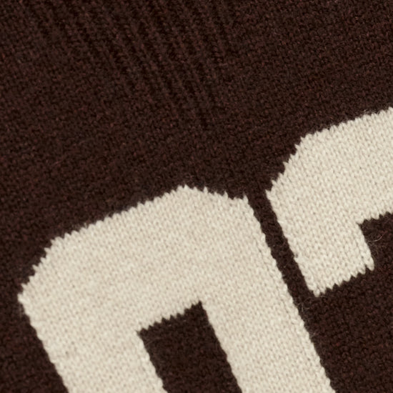 brown cashmere round neck sweater with 03 on front close up