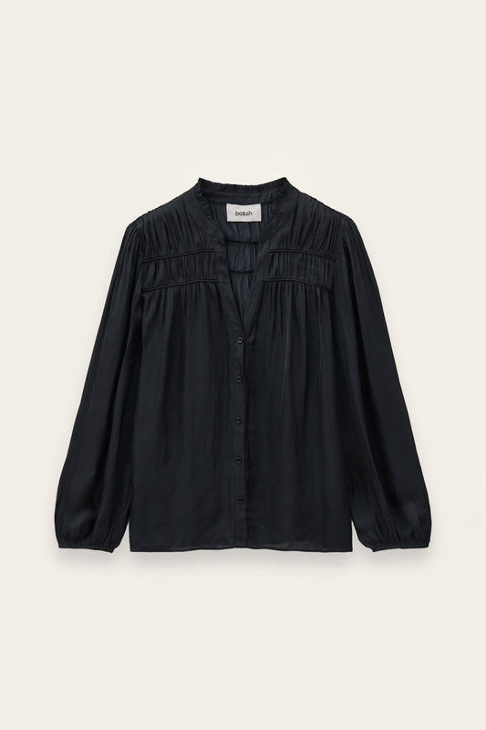 A black long-sleeve blouse with a gathered, pleated chest design and a button-down front, displayed flat against a light cream background.