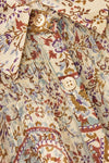 close up of blue brown and purple paisley print