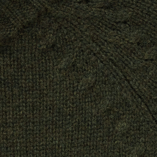 Close-up of a dark olive green knit fabric texture with a ribbed pattern.