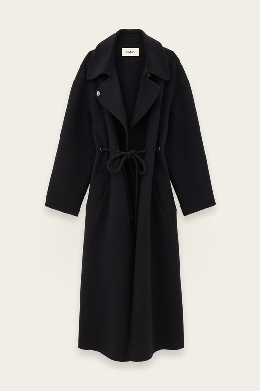 A long dark blue wool-blend coat with a tie belt, wide lapels, and front patch pockets, shown flat against a light off-white background.