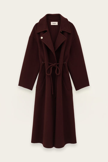 A dark burgundy wool-blend coat with a tie belt and notched lapels, shown flat against a light off-white background.