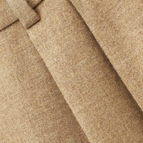Close up of material on beige trouser