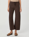 A model wearing dark brown wide-leg cropped pants with a drawstring waist, paired with brown slide sandals, against a light gray studio background.