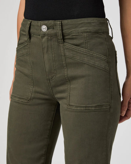 straight leg vintage green jeans with cargo style pockets close up