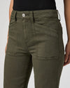 straight leg vintage green jeans with cargo style pockets close up