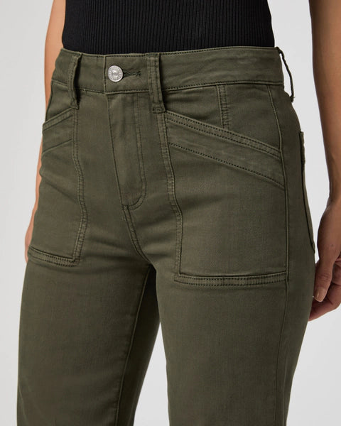 straight leg vintage green jeans with cargo style pockets close up