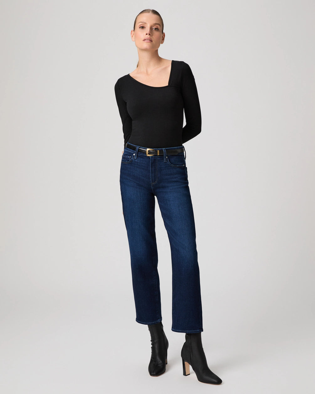 blue ankle length straight leg jeans from paige model shot